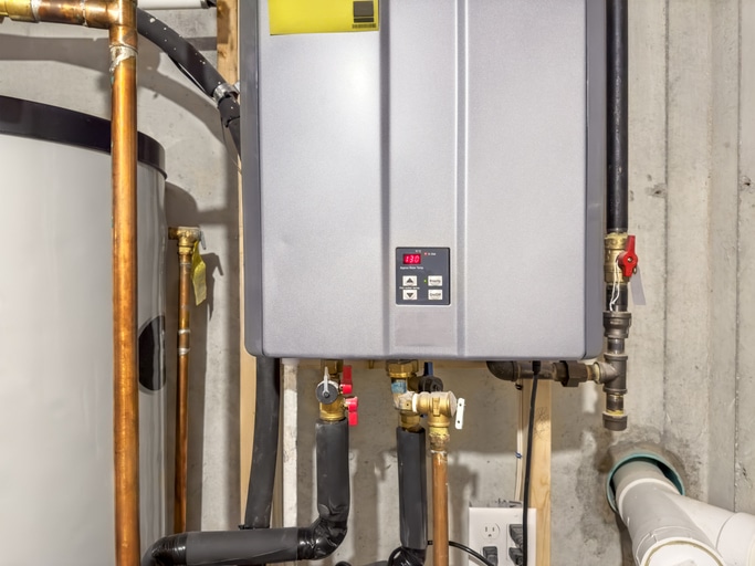 A tankless water heater installed and operational.