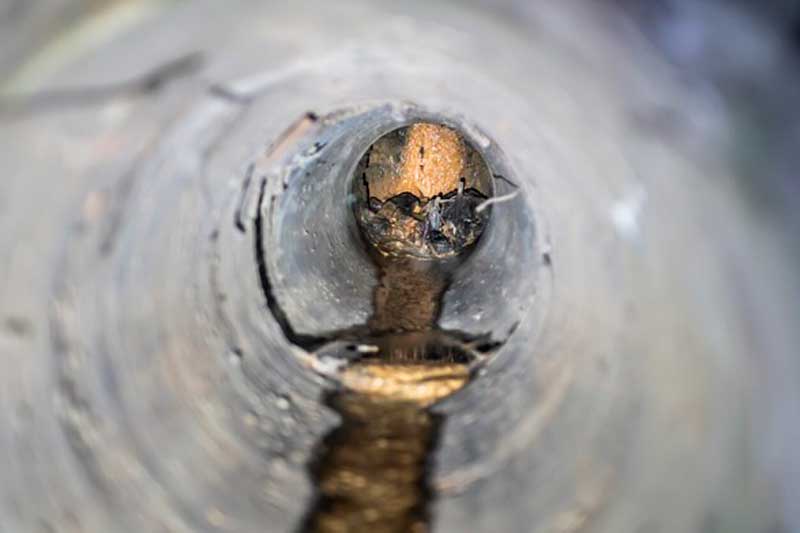 interior of cleared main sewer line pipe